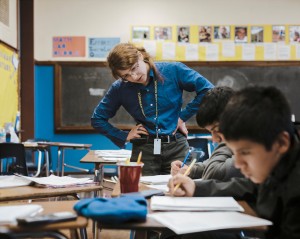 At Edwin G. Foreman High School in Chicago earlier this year, Avery Huberts watched as Christophir Rangel and Iann Trigveros worked on a math problem. Photo by Whitten Sabbatini for The New York Times 