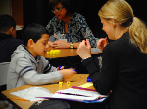 Charlotte-Mecklenburg Schools student works with Heart Math Tutoring volunteer.